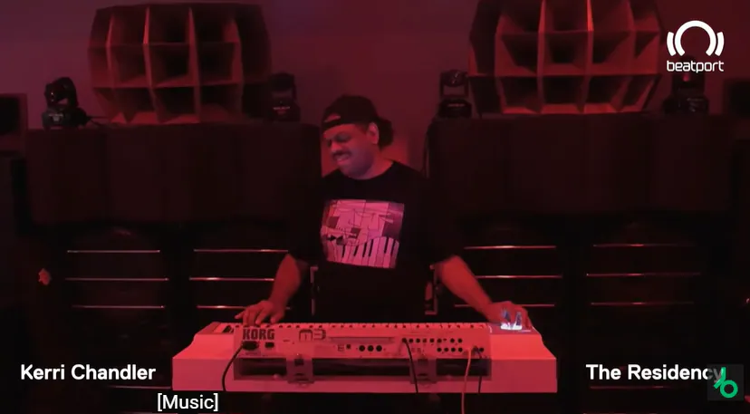 Kerri Chandler performing in his red-lit basement for Beatport's Residency